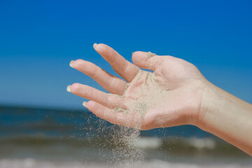 stylish beautiful hands sypyat sand sea summer on the nature