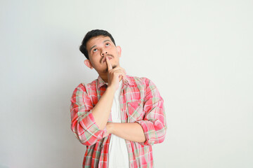 asian man showing thinking, doubtful expression