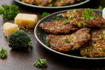 Fried Broccoli fritters or pancakes with parmesan and mozzarella cheese