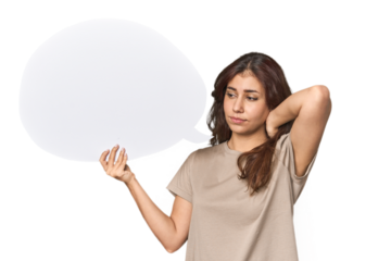 Middle Eastern woman holding comic bubble touching back of head, thinking and making a choice.