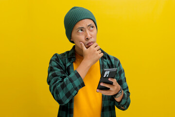 A puzzled and confused Asian man, dressed in a beanie hat and casual shirt, reacts to news on his...
