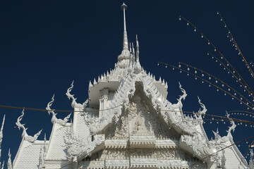 roof of a white Buddhist temple, Pattaya, Thailand
