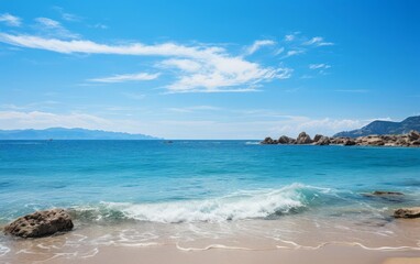 Obraz premium Summer landscape with blue sea and rocks on the beach
