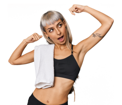 Caucasian young woman in sportswear raising fist after a victory, winner concept.