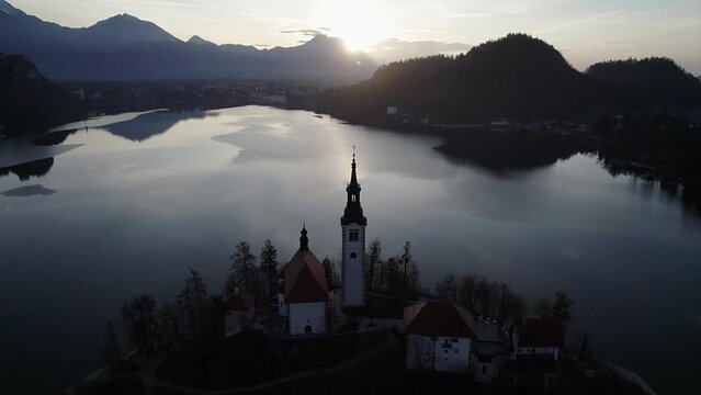 Island on lake bled at sunrise