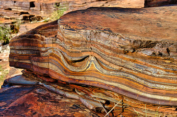 Cross section of disturbed banded iron formation in Karijini National park, in the Hamersley Range,...