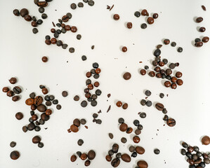 Coffee beans isolated on white background close up.