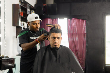 Professional Barber Styling Hair in a Modern Salon