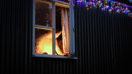 Man in Cabin at night