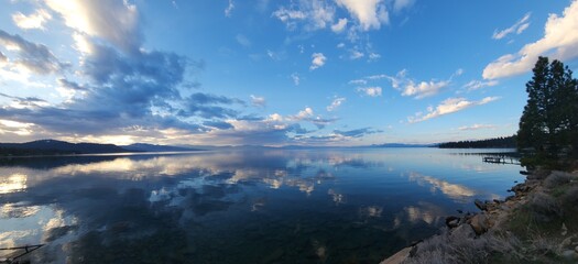 Morming over the lake tahoe water like glass