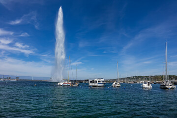 Beautiful view of the water Jet Fountain (Jet d'Eau fountain, 140 meters) in the lake of Geneva (Lac Leman). GENEVA, SWITZERLAND.