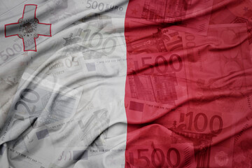 waving colorful national flag of malta on a euro money banknotes background. finance concept.