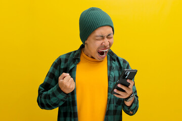 An angry Asian man, dressed in a beanie hat and casual shirt, visibly reacts to bad news while...
