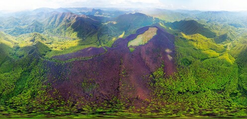 drone flies over a spring Carpathian peak with an interesting phenomenon - the mountain forest on...