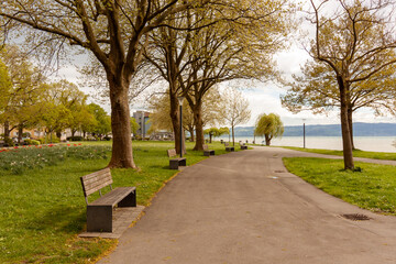 Deserted alleys of the park on the Langenargen embankment near Lake Constance