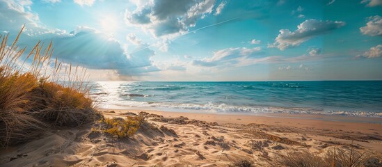 Beach and tropical blue sea. Ocean with big waves, rocks and cliff. Beautiful landscape on the caribbean island and wild sea waves. Warm sun light.
 - Powered by Adobe