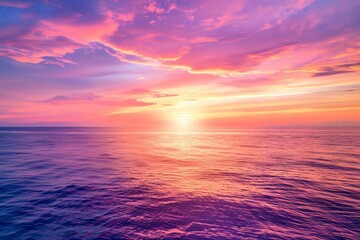 Fototapeta premium Breathtaking sunset over the ocean with vibrant purple and pink skies