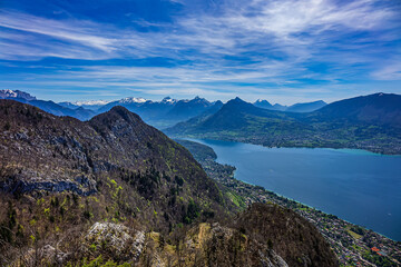 Wonderful views on a walk above the picturesque Lake Annecy. Route along the ridge from Mont Veyrier to Mont Baron from Annecy. Annecy, Haute-Savoie, France.