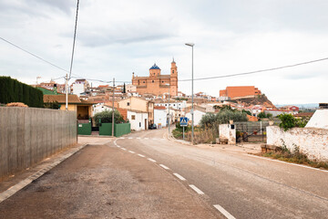 a paved road entering Samper de Calanda, province of Teruel, Aragon, Spain