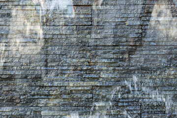 Stone wall and water stream