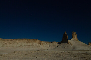 Night scene with the rock pinnacles of Bozzhira valley, Kazakhstan