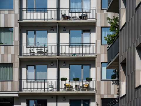 Courtyard and fasade of a modern residential house in a European city.