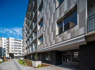 Courtyard and fasade of a modern residential house in a European city.