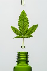 green bottle with a green cannabis leaf in it - obrazy, fototapety, plakaty