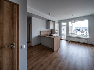 The interior of an apartment in a modern residential building in a European city.