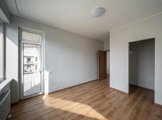 The interior of an apartment in a modern residential building in a European city.