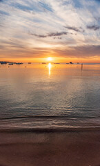 Fototapeta premium Beautiful red and orange sunrise over the sea.