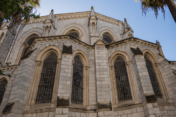 Roman Catholic Basilica of Notre Dame de Nice (Basilique de Notre-Dame-de-l'Assomption de Nice, 1864 -1868) on the Avenue Jean Medecin in the center of Nice. Nice, France.