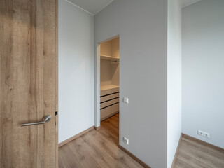 The interior of an apartment in a modern residential building in a European city.