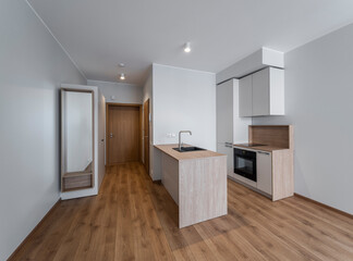 The interior of an apartment in a modern residential building in a European city.