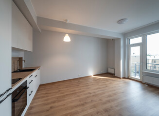 The interior of an apartment in a modern residential building in a European city.