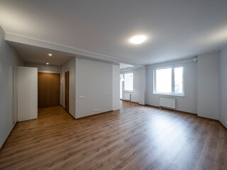 The interior of an apartment in a modern residential building in a European city.