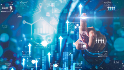 Conceptual technology in finance, hand interacting with digital elements representing financial growth and data analysis