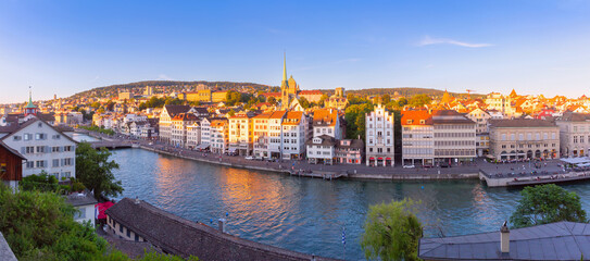 Aerial panoramic view of Old Town and river Limmat during morning blue hour in Zurich, Switzerland