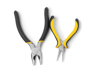 Obraz premium Different pliers isolated on white, top view