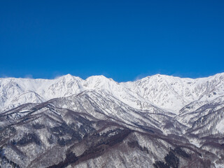 冬の白馬村　冠雪した北アルプス　白馬三山
