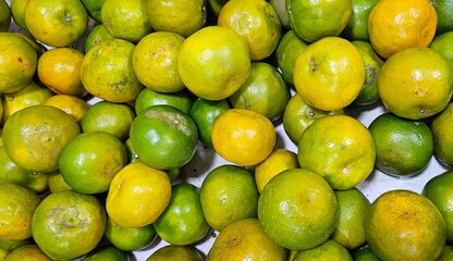 many tangerines in the market, fruit stalls, tropical fruits, tangerine backgrounds, citrus backgrounds, 