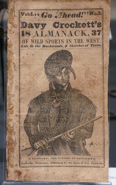 San Antonio, Texas, U.S - April 9, 2024 - The Davy Crockett's Almanac No 37 on display inside of the Alamo Exhibit