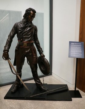 San Antonio, Texas, U.S - April 9, 2024 - The statue of William Barret Travis displayed inside of the Alamo Exhibit