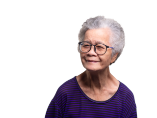 Portrait of an elderly Asian woman looking at the camera with a smile while standing on a transparent background.
