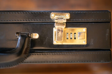Old briefcase with lock code.