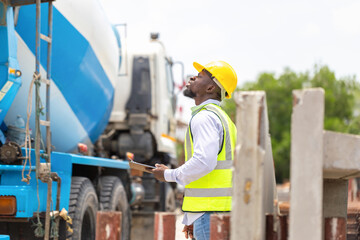 Foreman worker checking project at the precast factory site, Engineer man hardhats on construction site