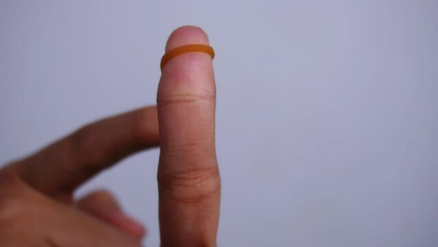 playing rubber by hand isolated white background