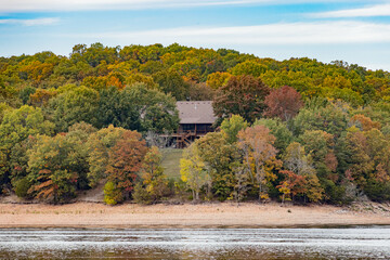 Fototapeta premium Sunny view of the beautiful fall color of Hobbs State Park-Conservation Area