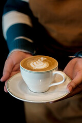 Cup of Coffee Latte in Hands