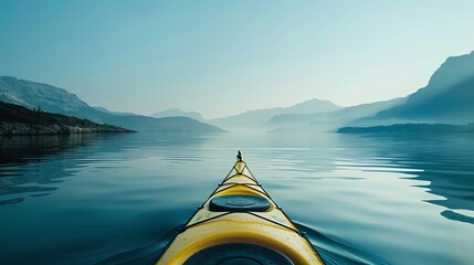 The image is of a yellow kayak on a calm lake. The water is crystal clear and reflects the sky and mountains in the background. - Powered by Adobe